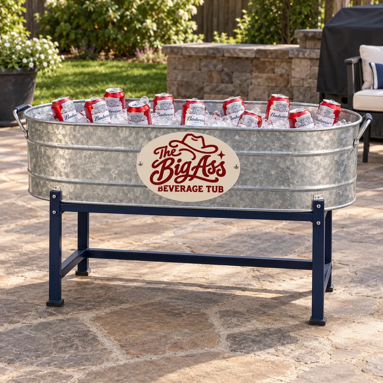 Long branded Big Ass Beverage Tub raised on a supporting stand.