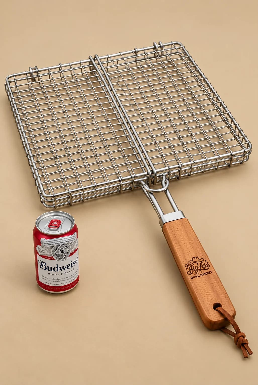 Large hinged metal Big Ass Grill Basket with wooden handle.