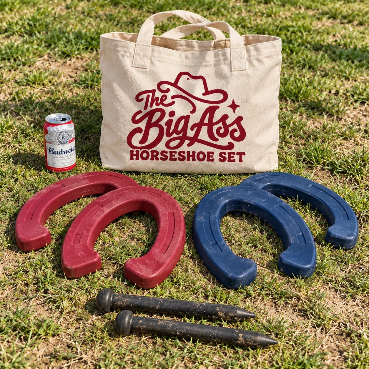 Oversized soft Big Ass Horseshoe game pieces arranged outdoors.