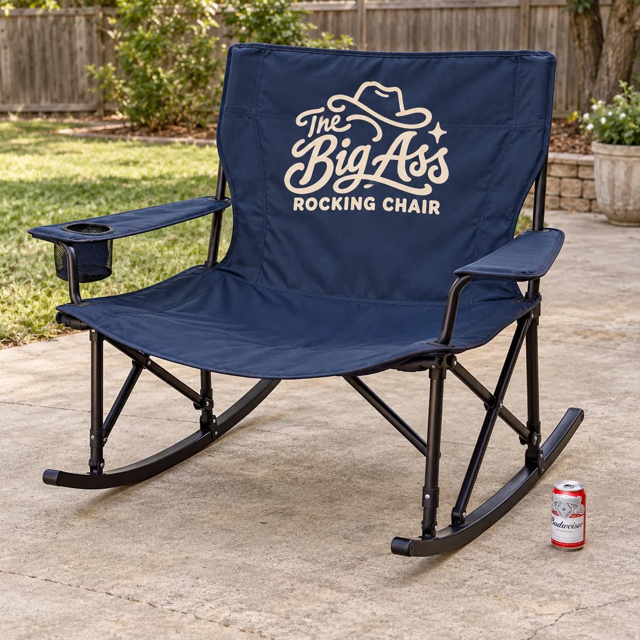 Wide folding outdoor rocking chair with a fabric back and curved supports.