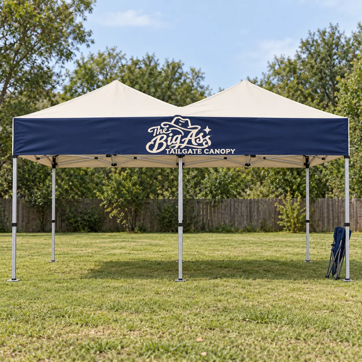 Extended Big Ass tailgate canopy supported by a metal frame.