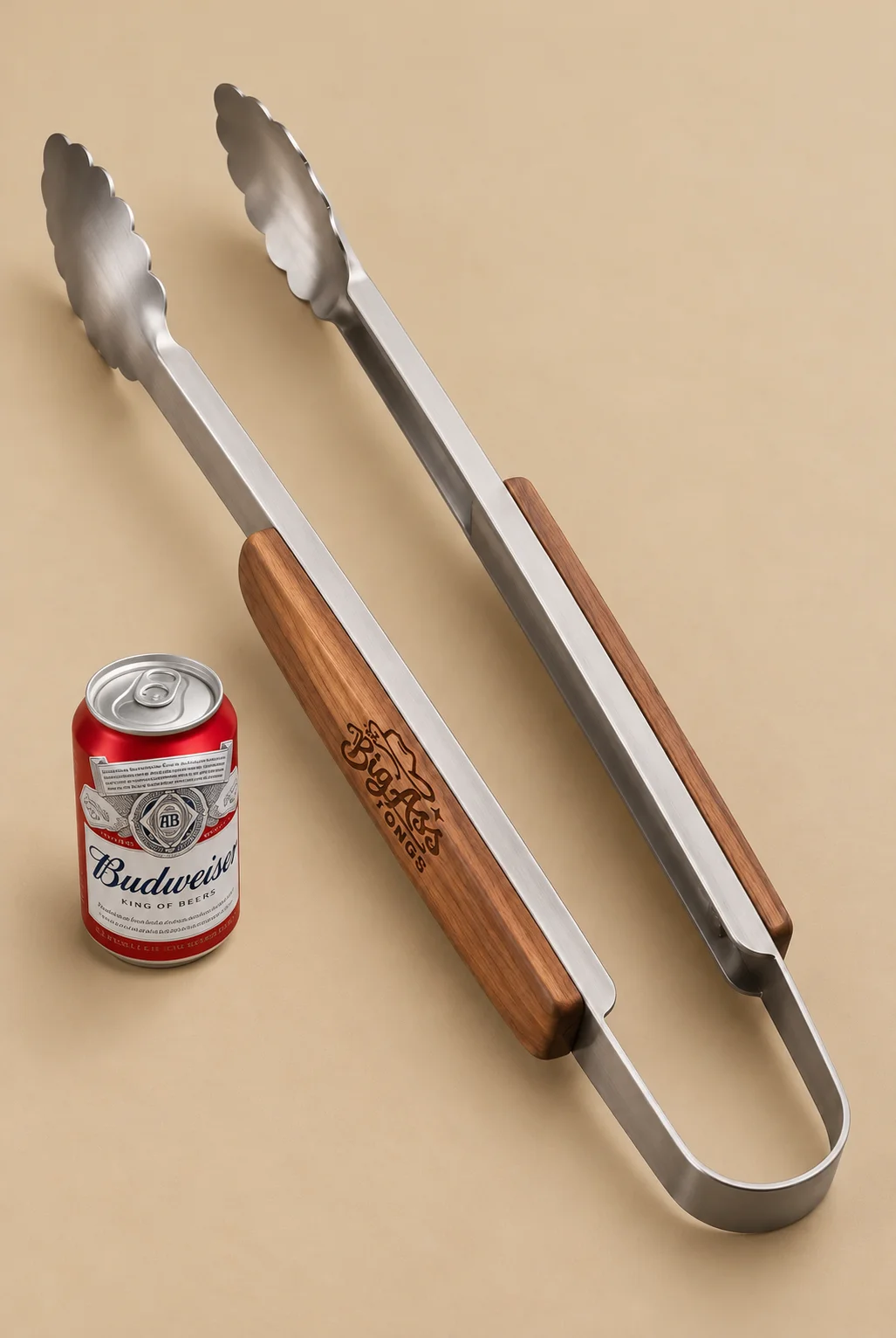 Long metal Big Ass Tongs with wooden grip panels.