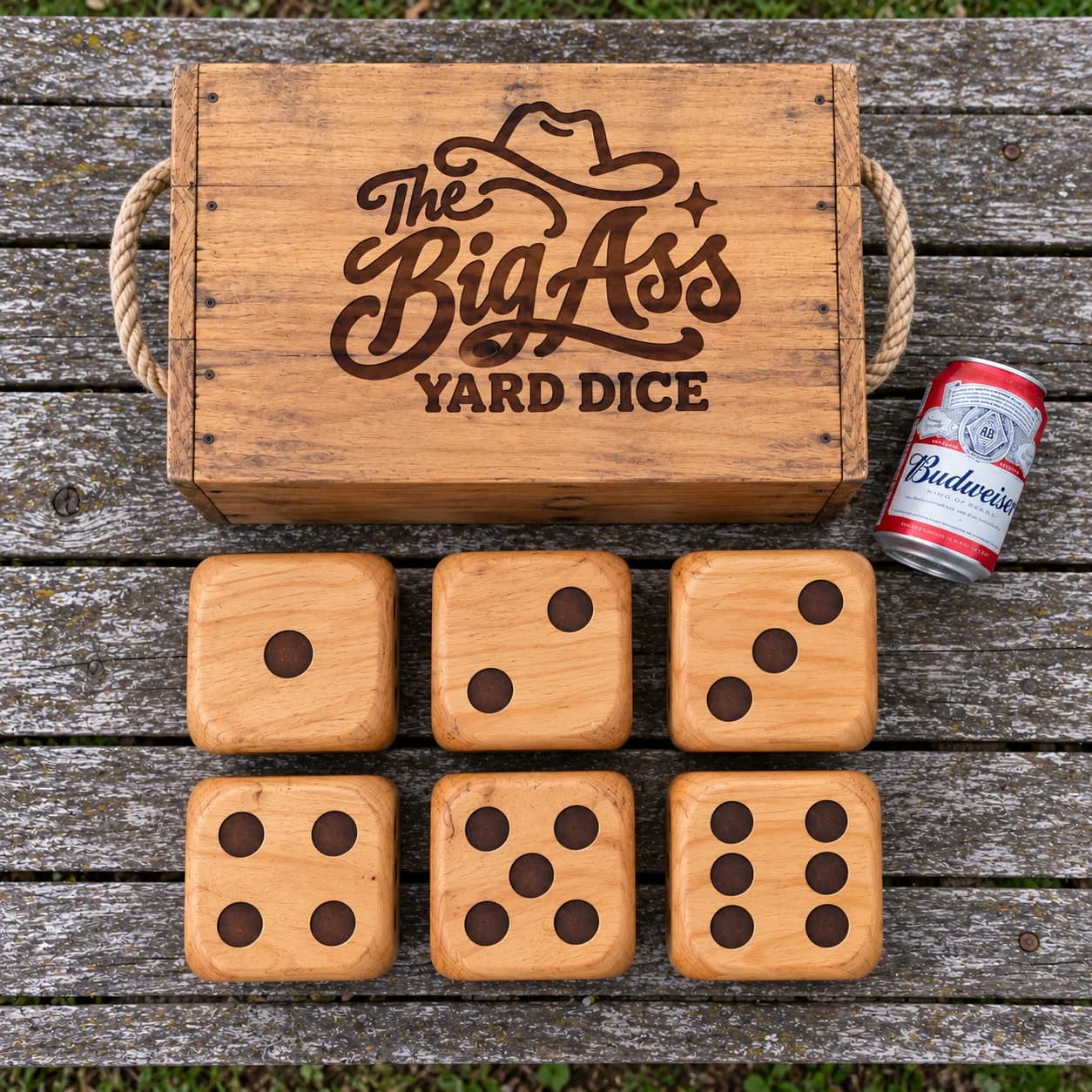 Oversized wooden yard dice with dark pip markings and Big Ass branding.